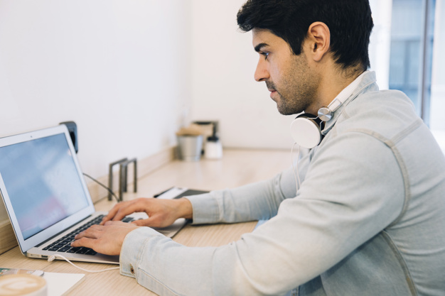 man-working-computer_23-2147826876