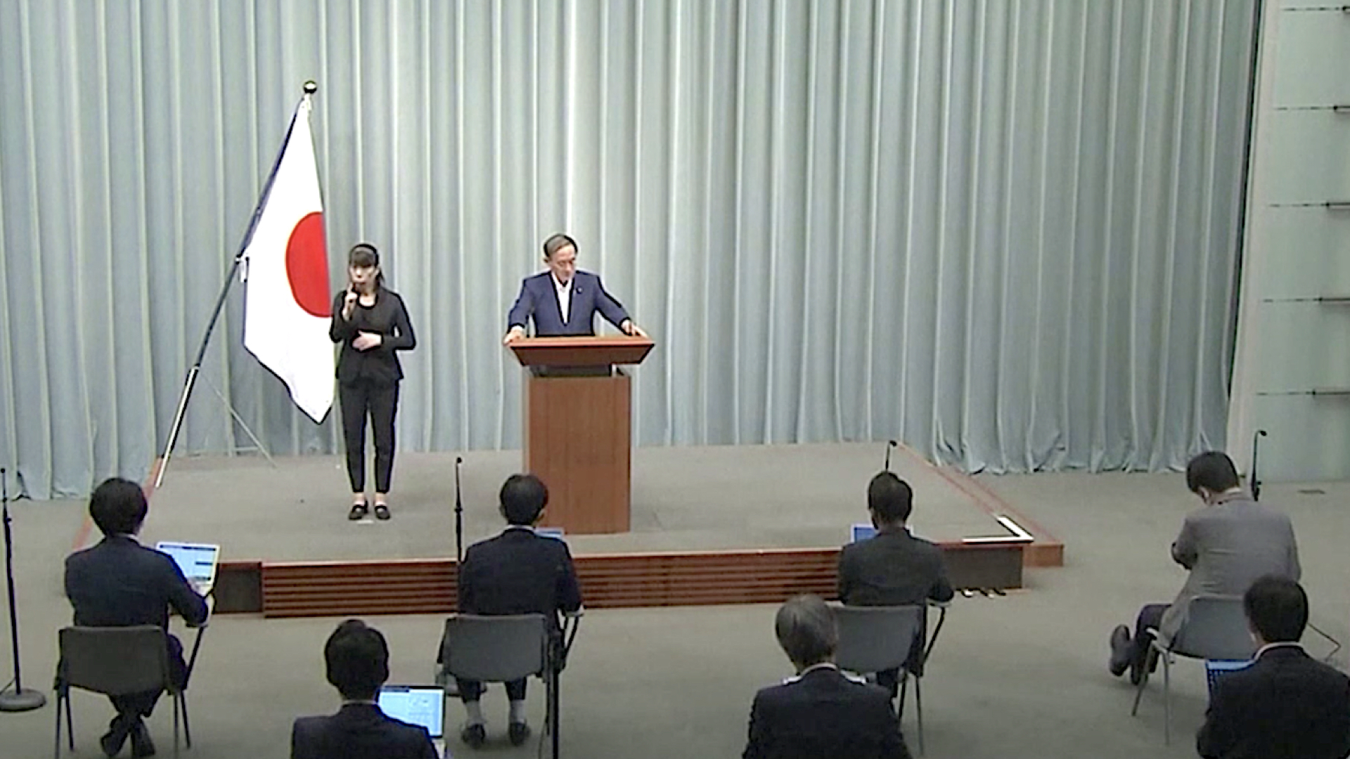 Yoshihide Suga Podium
