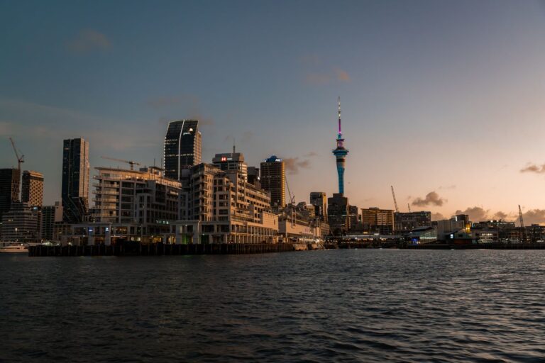 Auckland waterfront skyline with the Sky Tower at dusk