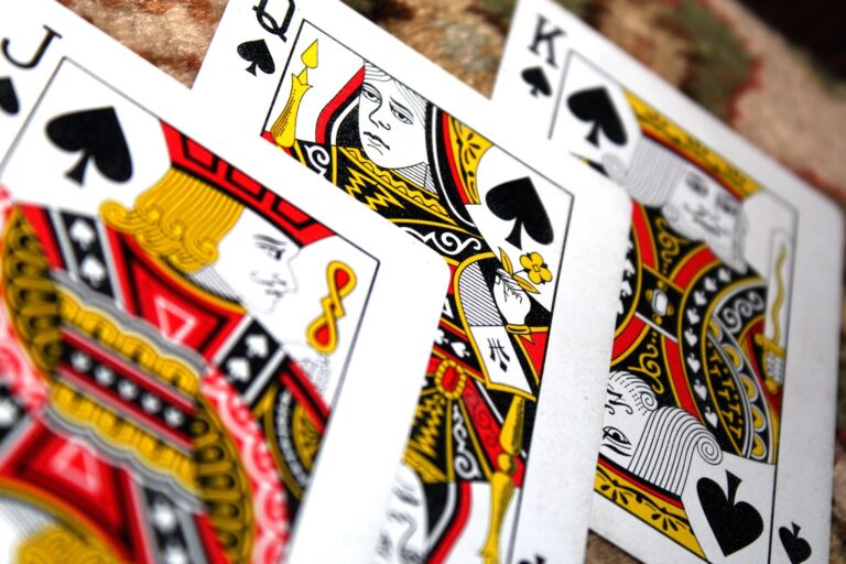 Close-up of playing cards on a dark table