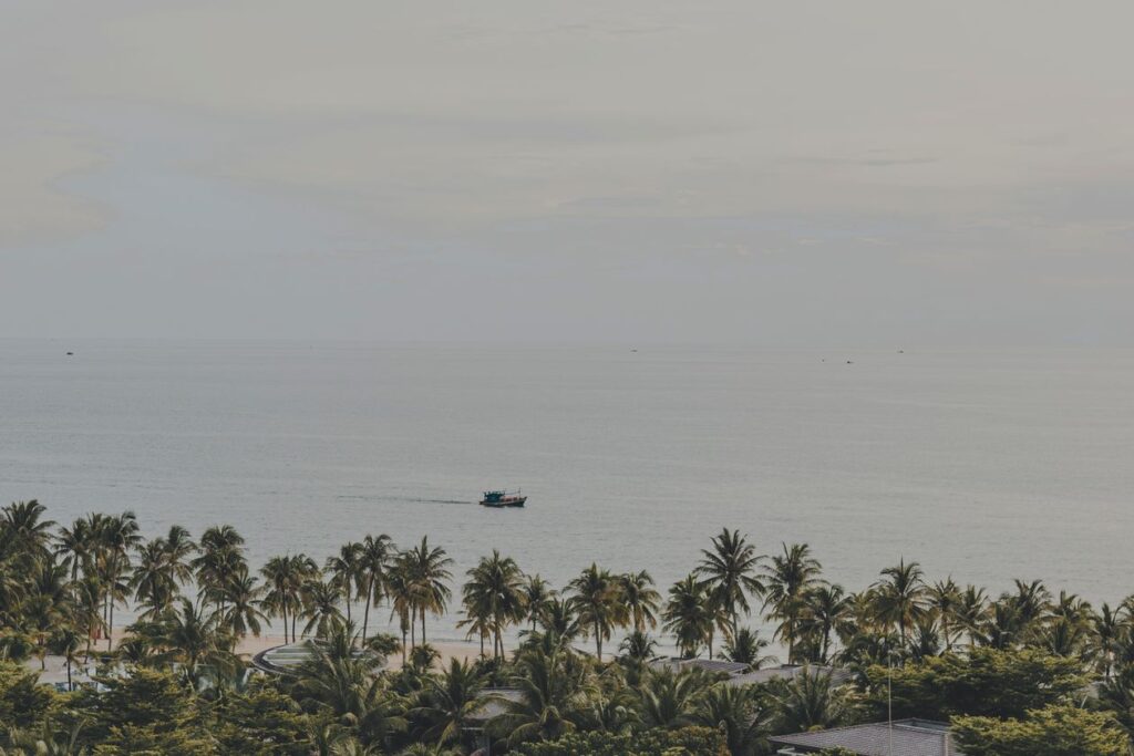 Palm-lined beach on Phu Quoc island, home of the Corona casino resort in Vietnam