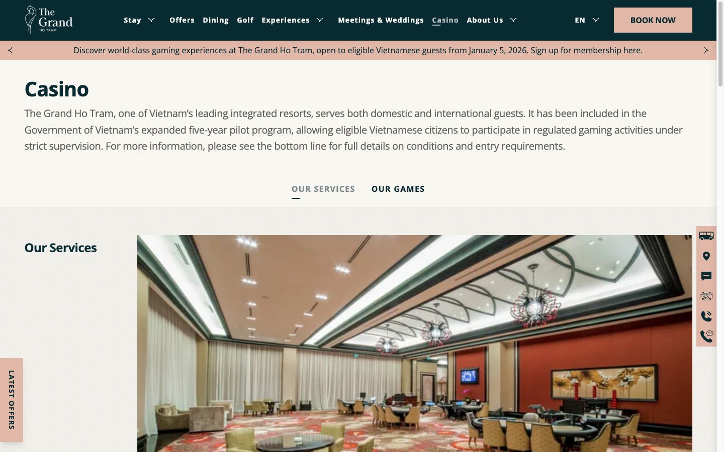 The Grand Ho Tram casino page on desktop with resort menu and gaming floor photo